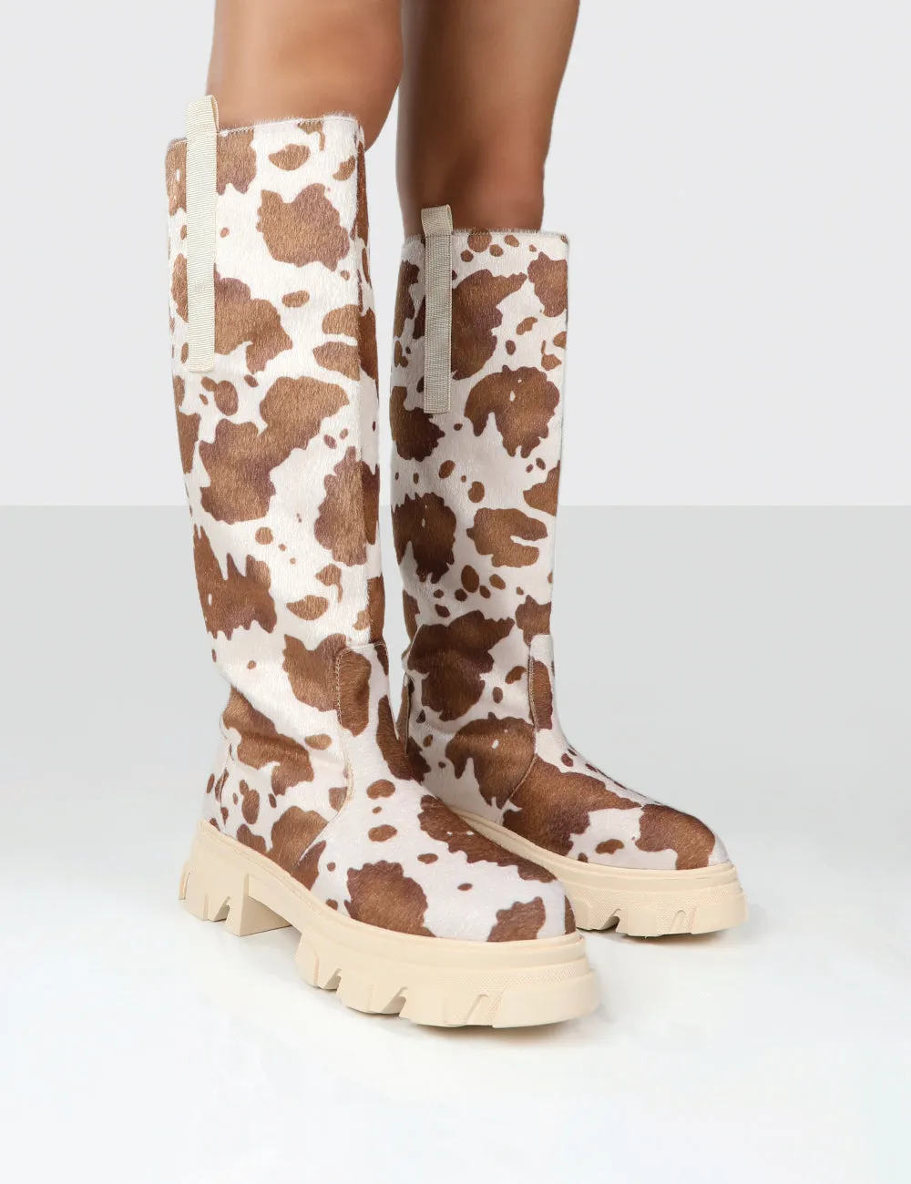 Amber x Public Desire Genius Cow Print Knee High Chunky Sole Boot